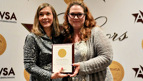 Kimberley Woodhouse receiving the 2024 Novella of the Year award
